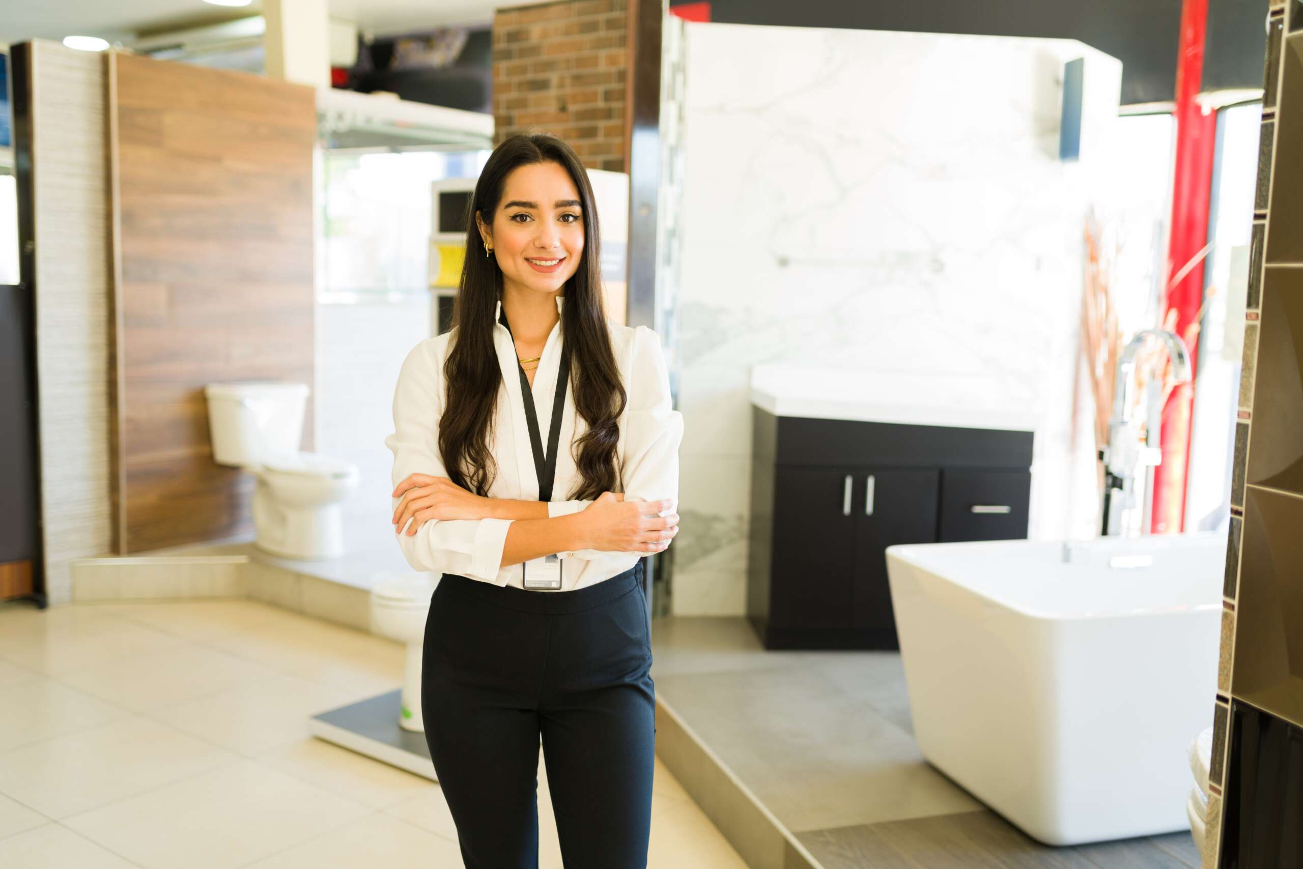 Hispanic,Salesperson,Smiling,And,Ready,To,Give,Customer,Service,At